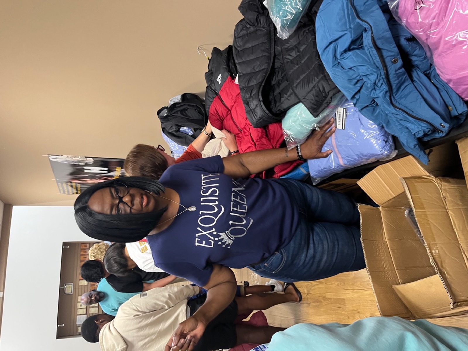 Volunteers preparing winter coats